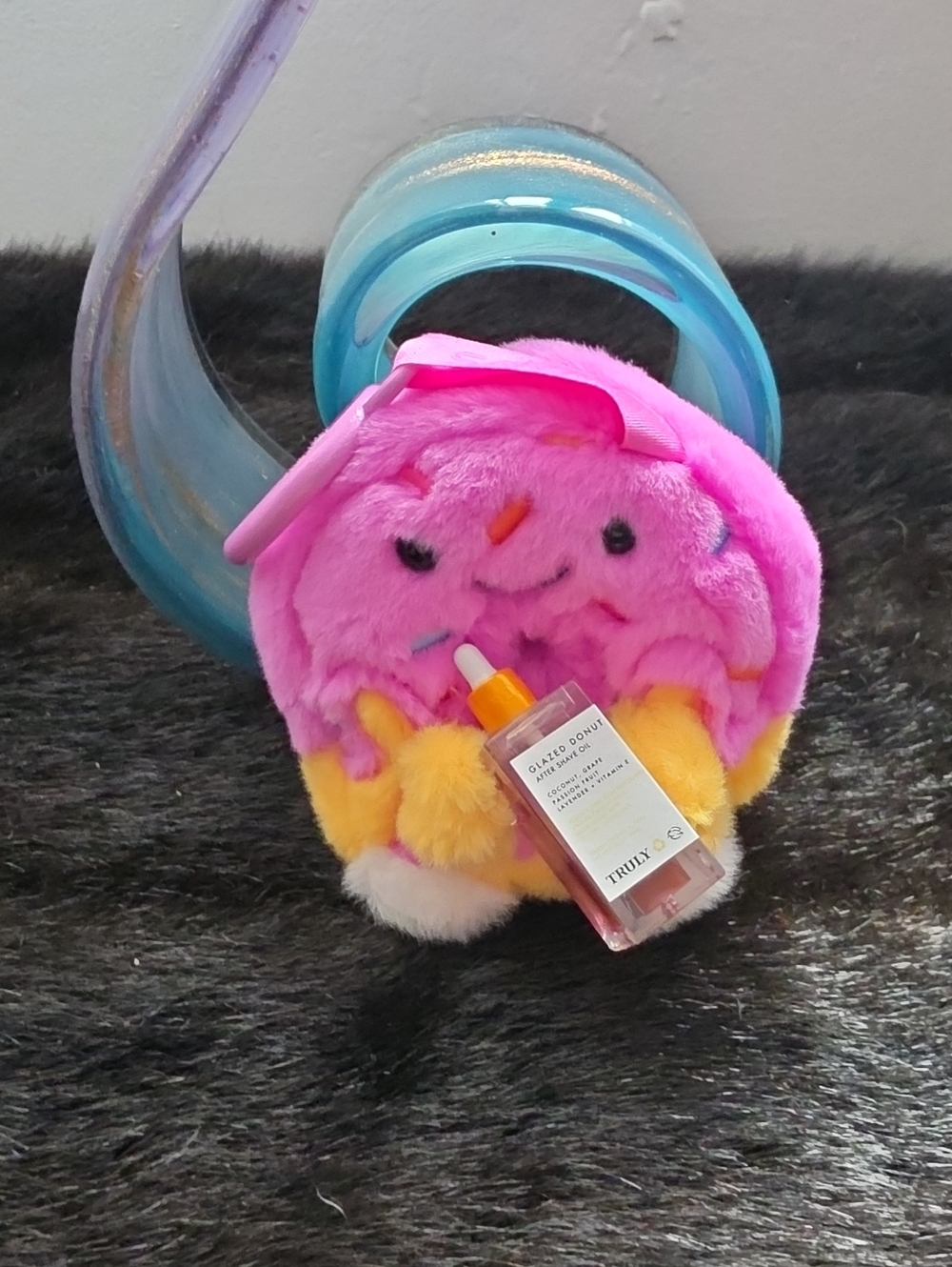 Plush Glazed Donut Character Bag Charm Holding After Shave Oil